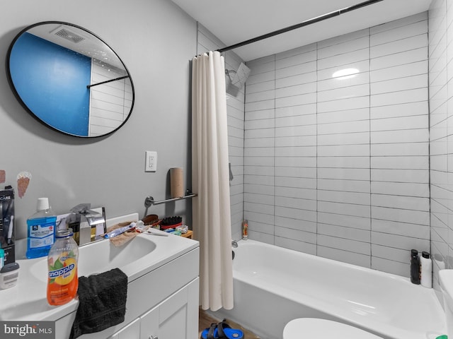 4951 W Thompson St, Philadelphia, PA 19131 - bathroom with toilet, shower / bathtub combination with curtain, and vanity