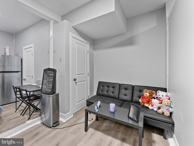 4951 W Thompson St, Philadelphia, PA 19131 - living area featuring wood finished floors and baseboards