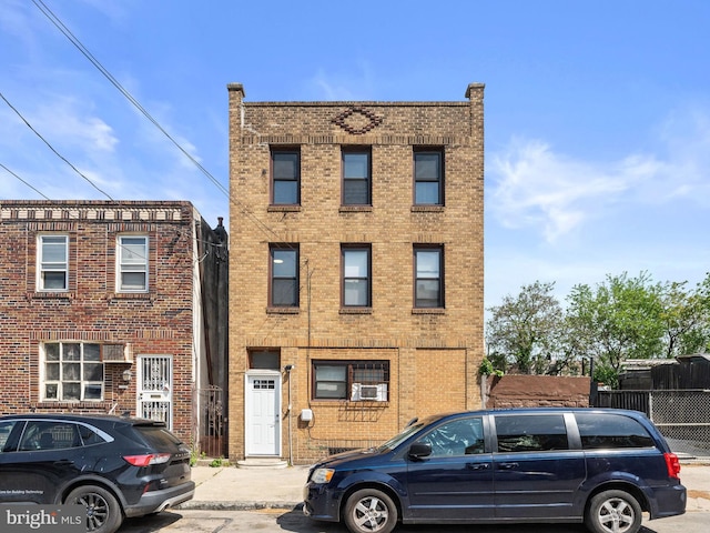 4951 W Thompson St, Philadelphia, PA 19131 - multi unit property with brick siding and cooling unit