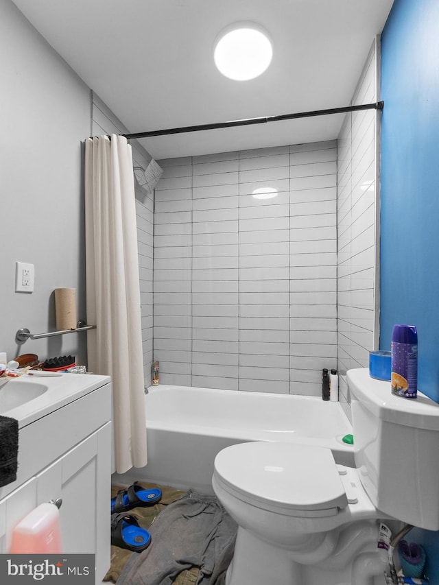 4951 W Thompson St, Philadelphia, PA 19131 - bathroom with toilet, shower / bath combo with shower curtain, and vanity