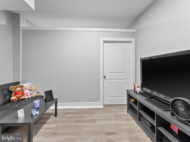 4951 W Thompson St, Philadelphia, PA 19131 - living area with light wood-type flooring and vaulted ceiling