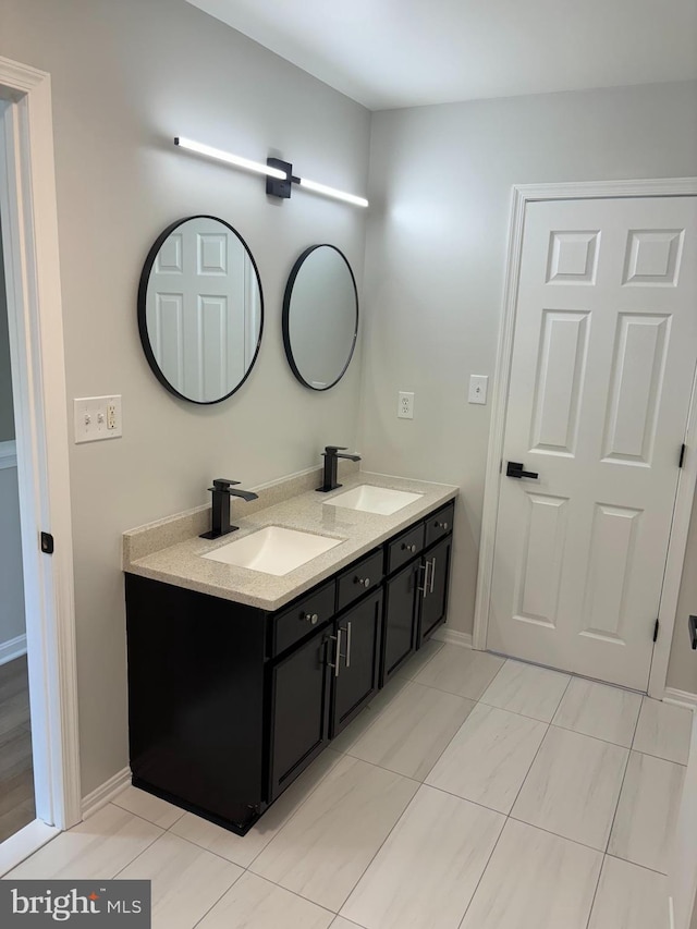 1853TOBIASDRIVESE Tobias Dr SE, Washington, DC 20020 - full bathroom featuring double vanity and baseboards