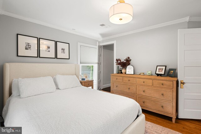 328 Avondale Ave, Haddonfield, NJ 08033 - bedroom featuring wood finished floors, crown molding, and baseboards