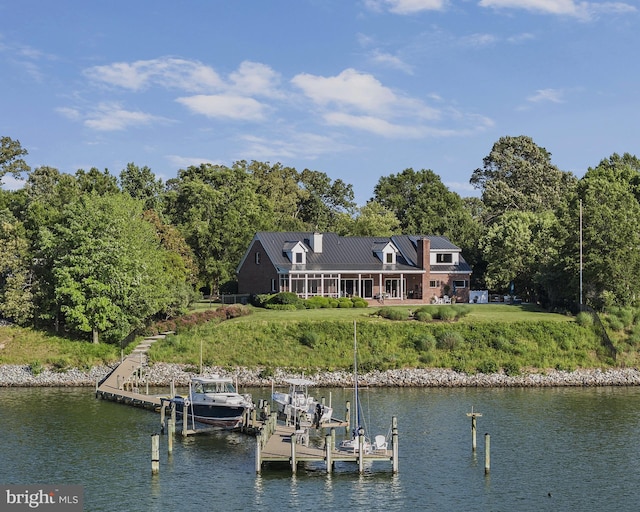 125 Oyster Pt, White Stone, VA 22578 - dock area with boat lift, a water view, and a view of trees