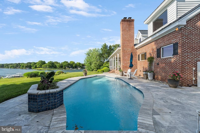 125 Oyster Pt, White Stone, VA 22578 - swimming pool featuring a patio, a water view, and a yard