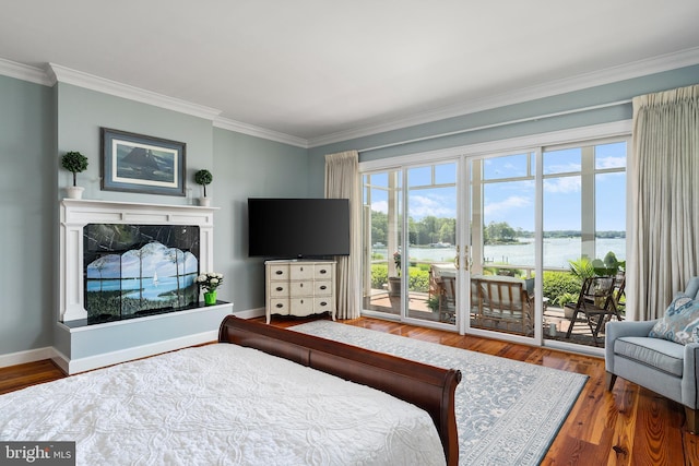 125 Oyster Pt, White Stone, VA 22578 - bedroom featuring access to outside, crown molding, wood finished floors, and baseboards