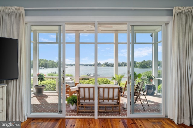 125 Oyster Pt, White Stone, VA 22578 - entryway featuring a water view, healthy amount of natural light, and wood finished floors