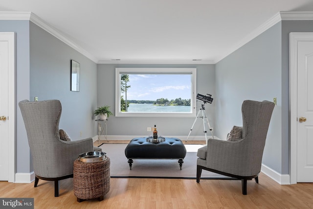125 Oyster Pt, White Stone, VA 22578 - sitting room with wood finished floors, baseboards, and crown molding
