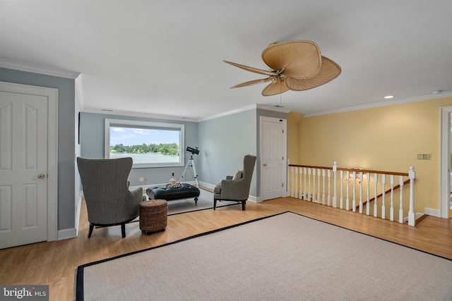 125 Oyster Pt, White Stone, VA 22578 - living area featuring an upstairs landing, wood finished floors, ornamental molding, a ceiling fan, and baseboards