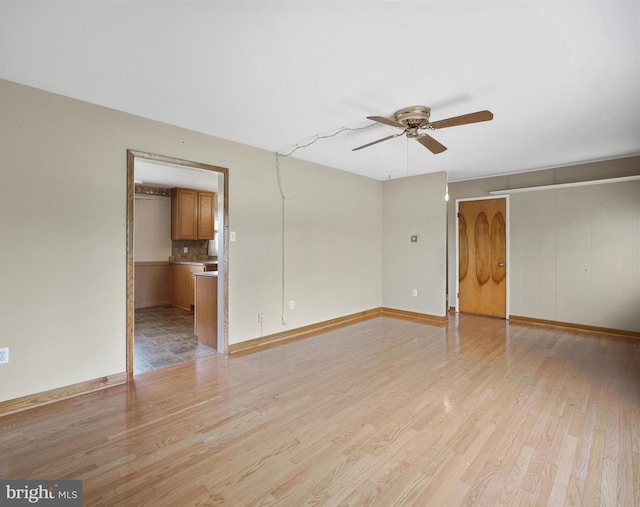 13914 Greencastle Pike, Hagerstown, MD 21740 - spare room featuring light wood finished floors, a ceiling fan, and baseboards