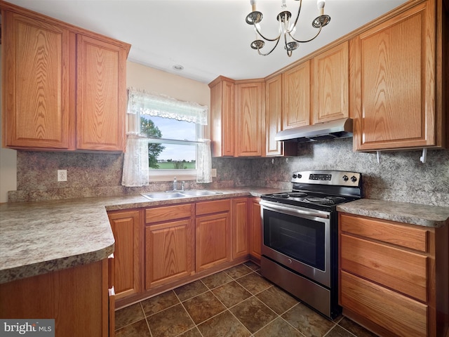 13914 Greencastle Pike, Hagerstown, MD 21740 - kitchen featuring stainless steel electric range oven, under cabinet range hood, a sink, and decorative backsplash
