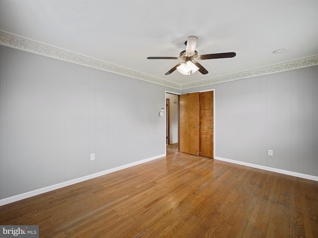 13914 Greencastle Pike, Hagerstown, MD 21740 - spare room with wood finished floors, ceiling fan, and baseboards