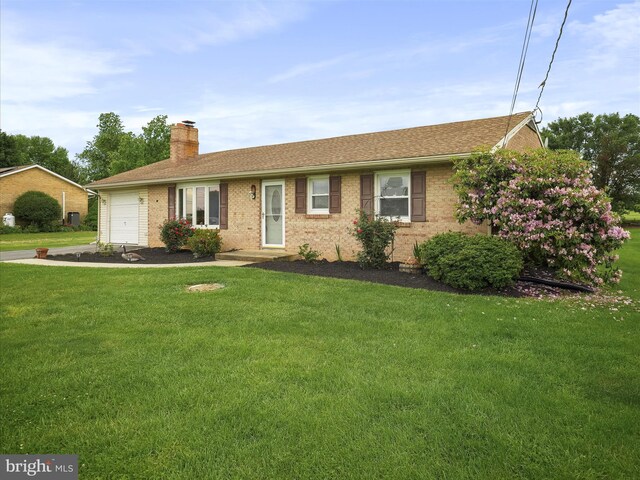 13914 Greencastle Pike, Hagerstown, MD 21740 - ranch-style home with a chimney, a front lawn, a garage, brick siding, and roof with shingles