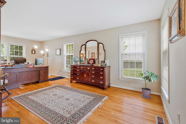 5617 Rowena Dr, Centreville, VA 20120 - office featuring light wood-type flooring, healthy amount of natural light, and baseboards