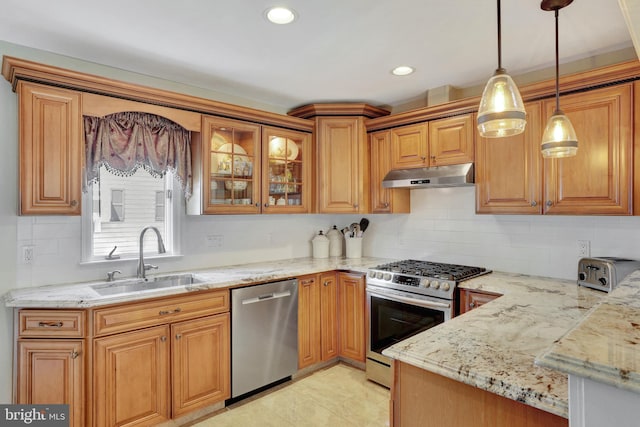 166 Grayson Ave, Hamilton, NJ 08619 - kitchen featuring stainless steel appliances, under cabinet range hood, a sink, hanging light fixtures, and light stone countertops