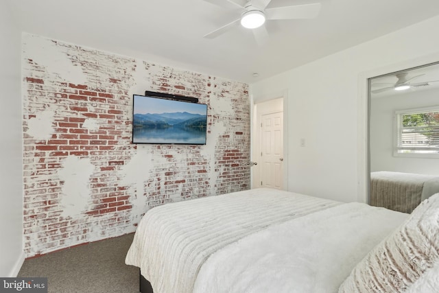 39 Village Ln, Levittown, PA 19054 - carpeted bedroom with brick wall and a ceiling fan