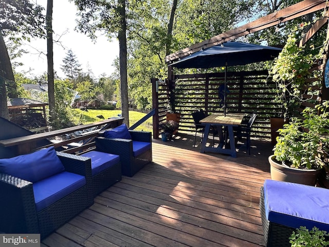 wooden deck featuring an outdoor living space and outdoor dining space