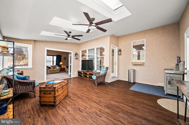 5 Craig Ln, Malvern, PA 19355 - living room featuring a skylight, a textured wall, wood finished floors, and a ceiling fan