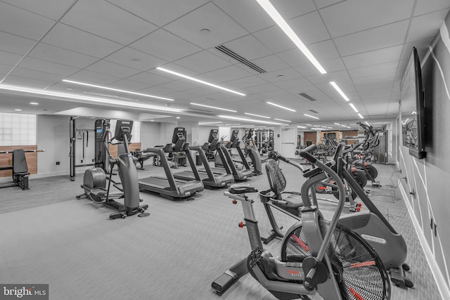 631 D St NW Unit 431, Washington, DC 20004 - exercise room with a paneled ceiling, baseboards, and carpet flooring