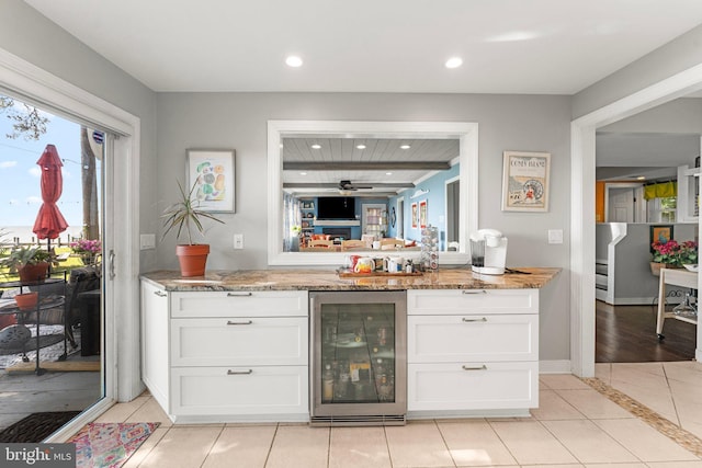 105 Bayview Ln, Hague, VA 22469 - bar with wine cooler, light tile patterned flooring, recessed lighting, ceiling fan, and baseboards