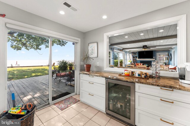 105 Bayview Ln, Hague, VA 22469 - bar area featuring wine cooler, light tile patterned floors, recessed lighting, a ceiling fan, and beam ceiling