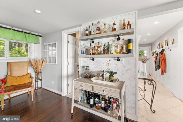 105 Bayview Ln, Hague, VA 22469 - indoor dry bar with recessed lighting, wood finished floors, and baseboards