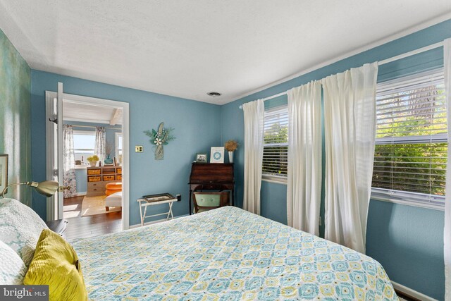 105 Bayview Ln, Hague, VA 22469 - bedroom with wood finished floors and baseboards