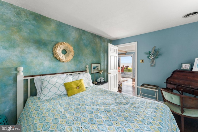 105 Bayview Ln, Hague, VA 22469 - bedroom with baseboards and wood finished floors