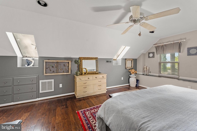 105 Bayview Ln, Hague, VA 22469 - bedroom featuring a skylight, wood finished floors, lofted ceiling, baseboards, and ceiling fan