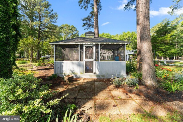 105 Bayview Ln, Hague, VA 22469 - view of front of home featuring a sunroom