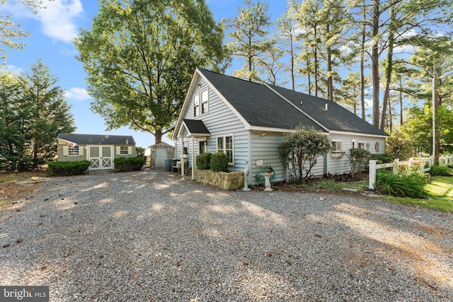 105 Bayview Ln, Hague, VA 22469 - view of front of property featuring gravel driveway and a shingled roof