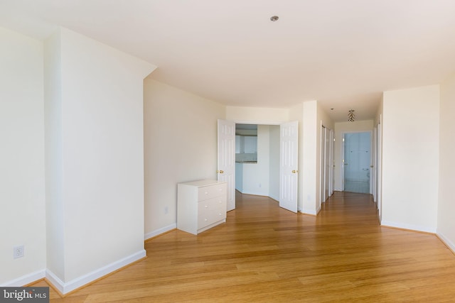 100 Harborview Dr Unit 513, Baltimore, MD 21230 - spare room with light wood-type flooring and baseboards