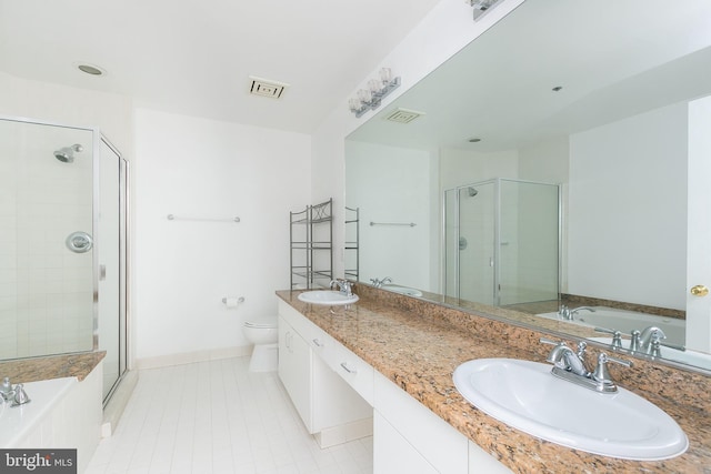 100 Harborview Dr Unit 513, Baltimore, MD 21230 - bathroom with a shower stall, a bath, toilet, baseboards, and tile patterned flooring