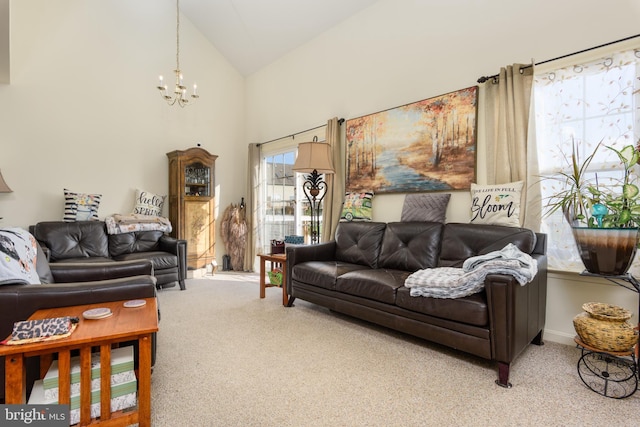 261 Osprey Ln, Hummelstown, PA 17036 - carpeted living area featuring a chandelier and high vaulted ceiling