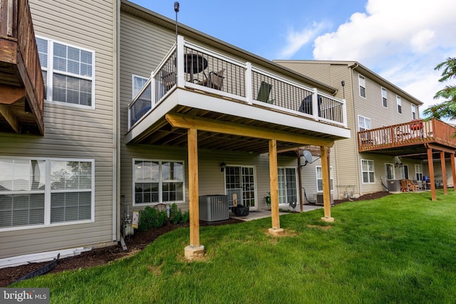261 Osprey Ln, Hummelstown, PA 17036 - back of house with a yard, cooling unit, and a deck