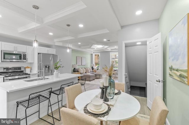 1505 N Pulaski St, Baltimore, MD 21217 - dining space with coffered ceiling, ornamental molding, light wood finished floors, recessed lighting, and beam ceiling