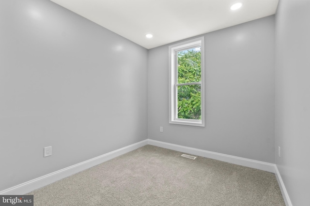 1505 N Pulaski St, Baltimore, MD 21217 - unfurnished room with baseboards, carpet, and recessed lighting