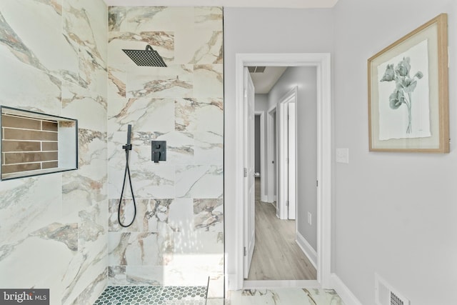 1505 N Pulaski St, Baltimore, MD 21217 - bathroom with a marble finish shower and marble finish flooring