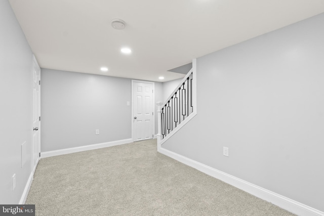 1505 N Pulaski St, Baltimore, MD 21217 - finished basement with recessed lighting, baseboards, carpet flooring, and stairway
