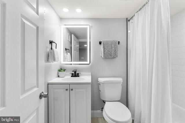 1505 N Pulaski St, Baltimore, MD 21217 - bathroom with vanity, toilet, shower / bath combo, and recessed lighting