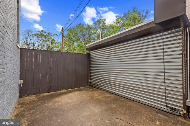 view of patio featuring fence