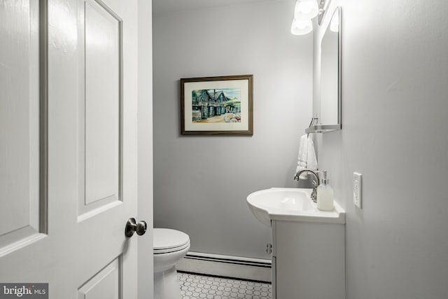 40 Hunters Run Rd, Honey Brook, PA 19344 - bathroom with a baseboard radiator, tile patterned floors, vanity, and toilet