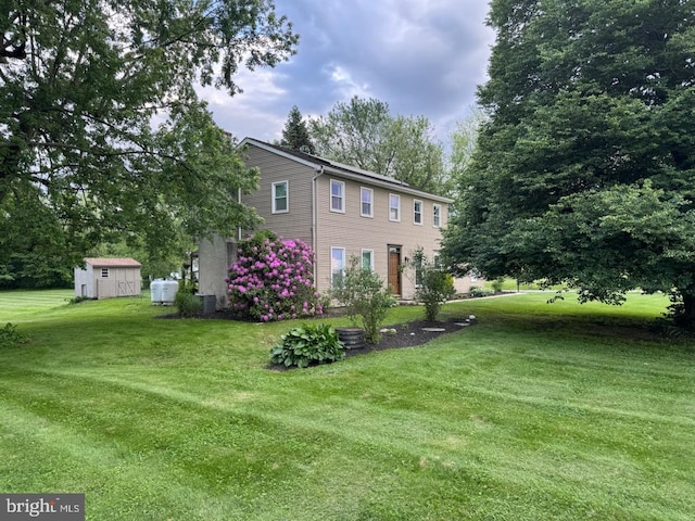 40 Hunters Run Rd, Honey Brook, PA 19344 - view of side of home with a lawn