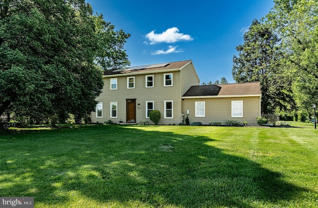 40 Hunters Run Rd, Honey Brook, PA 19344 - colonial house with solar panels and a front yard