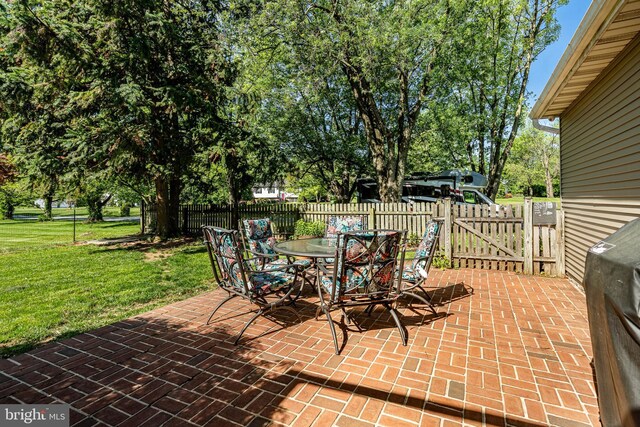 40 Hunters Run Rd, Honey Brook, PA 19344 - view of patio / terrace featuring a gate and outdoor dining space