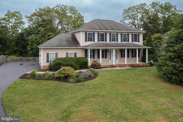 306 Canyon Rd, Winchester, VA 22602 - colonial home with a porch, driveway, and roof with shingles