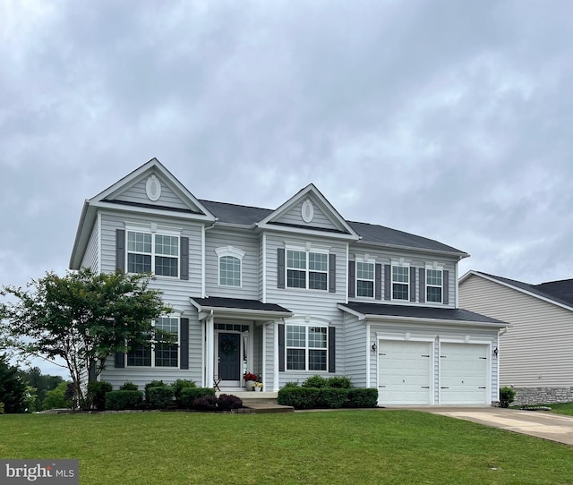 205 Dartmoor Dr, Stephens City, VA 22655 - view of front of house with driveway, a front yard, and an attached garage