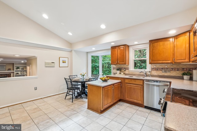2032 Franklin Cluster Ct, Falls Church, VA 22043 - kitchen featuring dishwasher, a sink, light countertops, tasteful backsplash, and lofted ceiling
