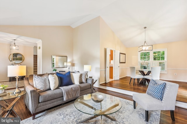 2032 Franklin Cluster Ct, Falls Church, VA 22043 - living room with wood finished floors, high vaulted ceiling, and baseboards