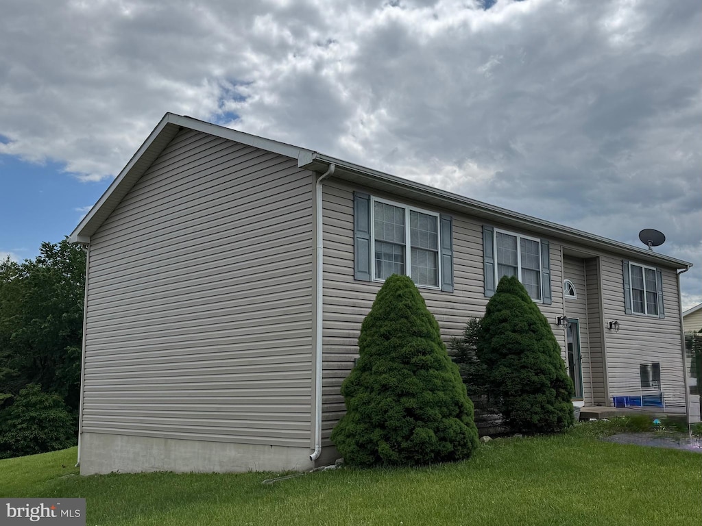23 Virgo Ln, Martinsburg, WV 25404 - view of home's exterior with a lawn